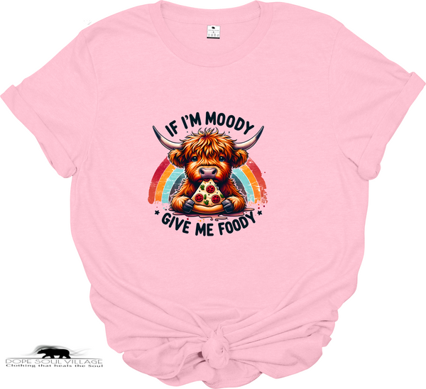 “If I’m Moody, Give Me Foody” t-shirt. Highland cow graphic, sustainable materials. Fun, cheeky tee perfect for animal lovers and ethical fashion fans. pink