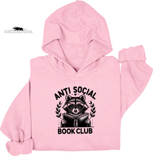 Pink hoodie with raccoon graphic and 'Anti Social Book Club' text on a white background