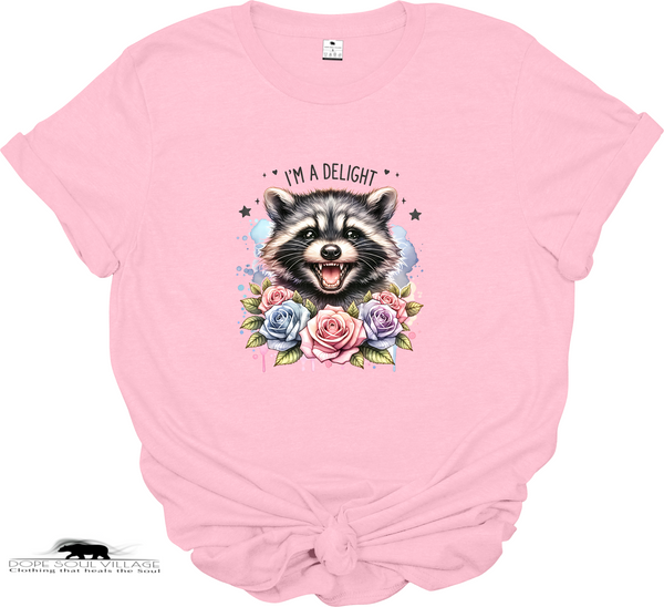 Pink t-shirt with a raccoon graphic and floral design on a white background