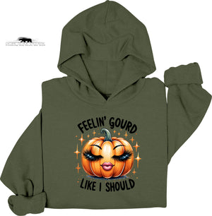 Green hoodie with a pumpkin graphic and text on a white background
