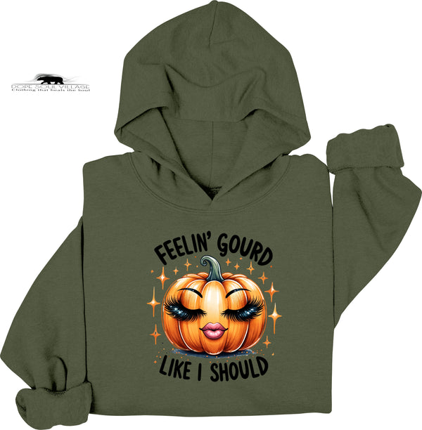 Green hoodie with a pumpkin graphic and text on a white background