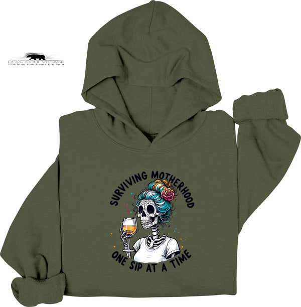 Green hoodie with a skeleton design and text on a white background