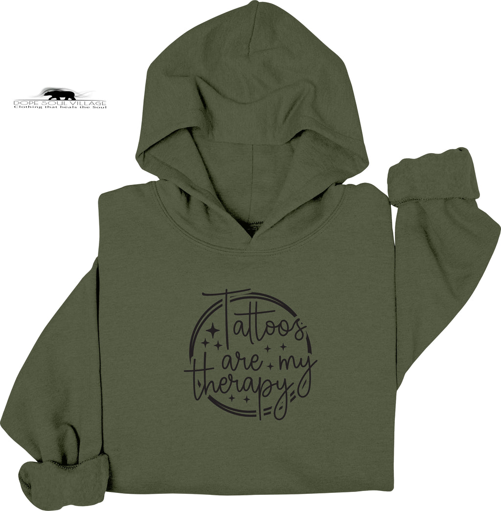 Green hoodie with 'Tattoos are my therapy' text on a white background