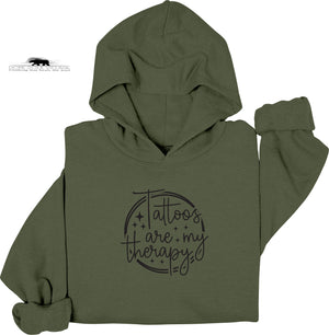 Green hoodie with 'Tattoos are my therapy' text on a white background