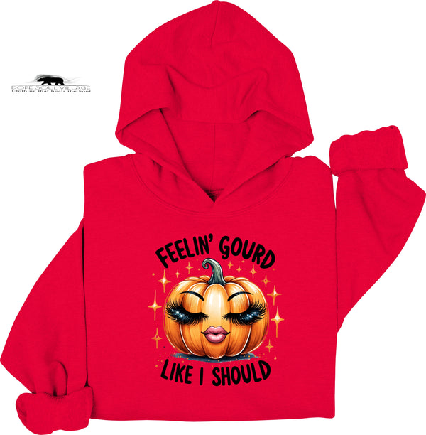 Red hoodie with a pumpkin graphic and text on a white background
