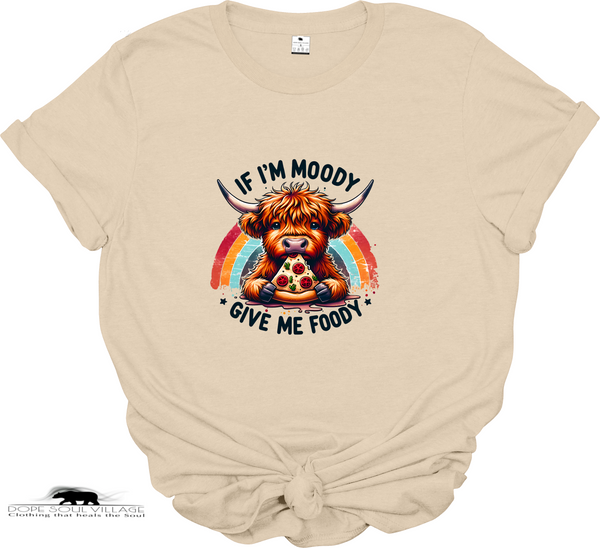 “If I’m Moody, Give Me Foody” t-shirt. Highland cow graphic, sustainable materials. Fun, cheeky tee perfect for animal lovers and ethical fashion fans.