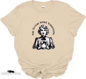 Beige t-shirt with black graphic and text 'The Future Looks Exhausting' on a white background