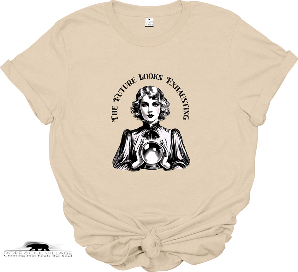 Beige t-shirt with black graphic and text 'The Future Looks Exhausting' on a white background