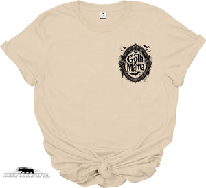 Beige t-shirt with 'Goth Mama' graphic design on a white background