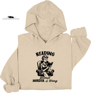 Beige hoodie with a graphic of a woman reading and text 'Reading because murder is wrong' on a white background.