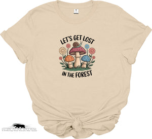 Beige t-shirt with a forest-themed graphic and text on a white background
