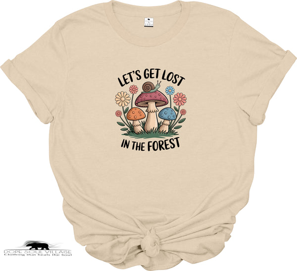 Beige t-shirt with a forest-themed graphic and text on a white background