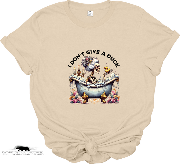 Beige t-shirt with cartoon character in bathtub and text 'I Don't Give a Duck' on a white background