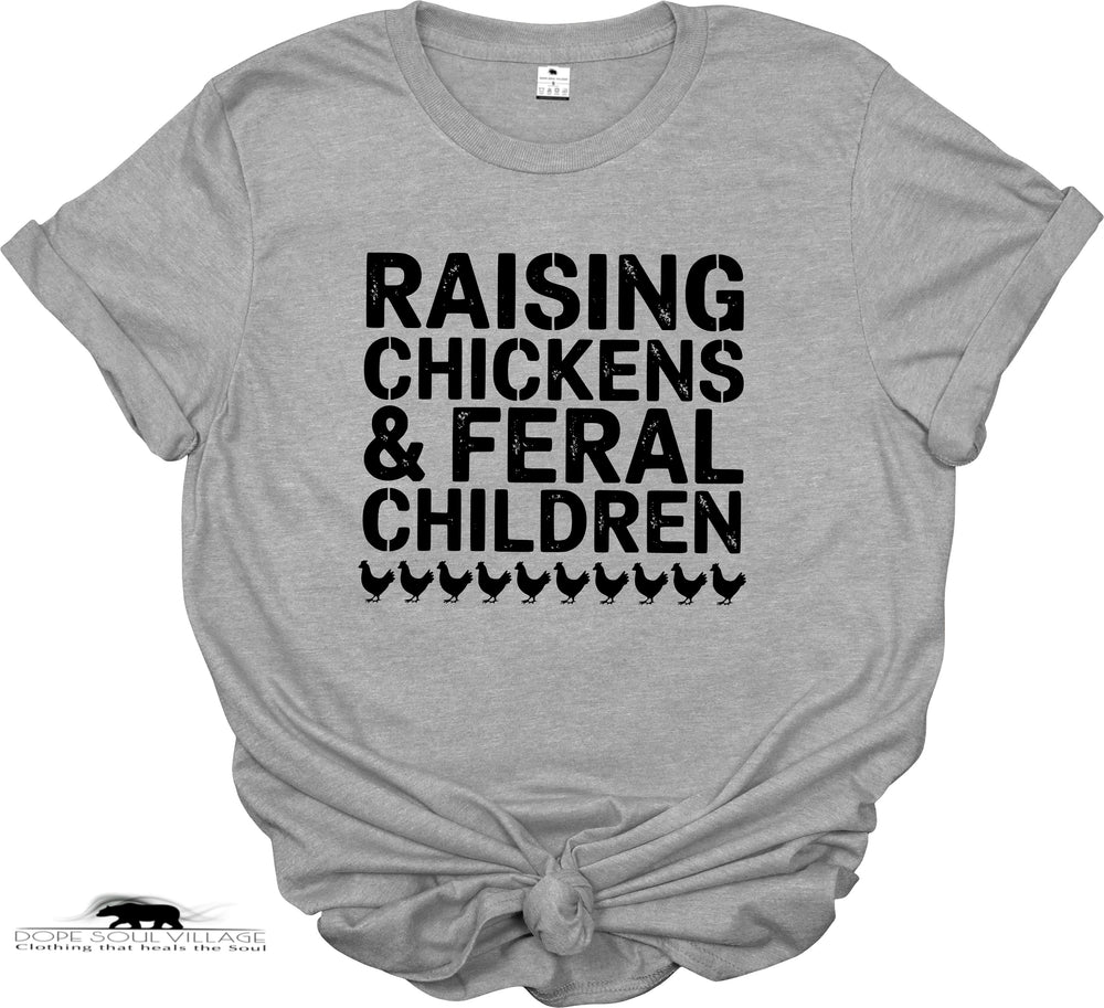 Gray t-shirt with black text 'RAISING CHICKENS & FERAL CHILDREN' on a white background