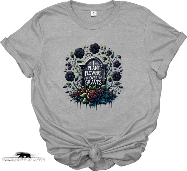 Gray t-shirt with floral and gravestone design on a white background