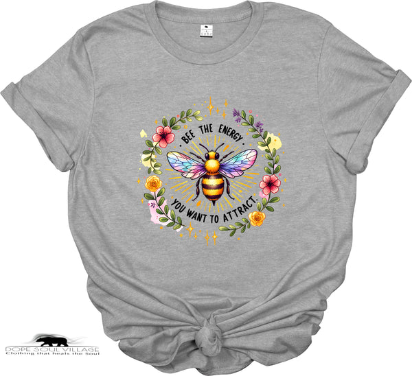 Gray t-shirt with a colorful bee and floral design on a white background