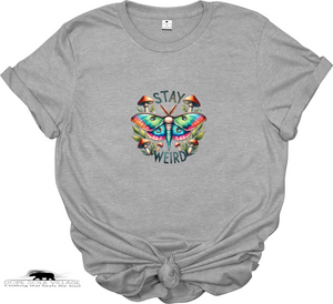 “Stay Weird” t-shirt with whimsical butterfly design. Sustainable, ethical tee perfect for individuality, quirky style, and magical everyday fashion.