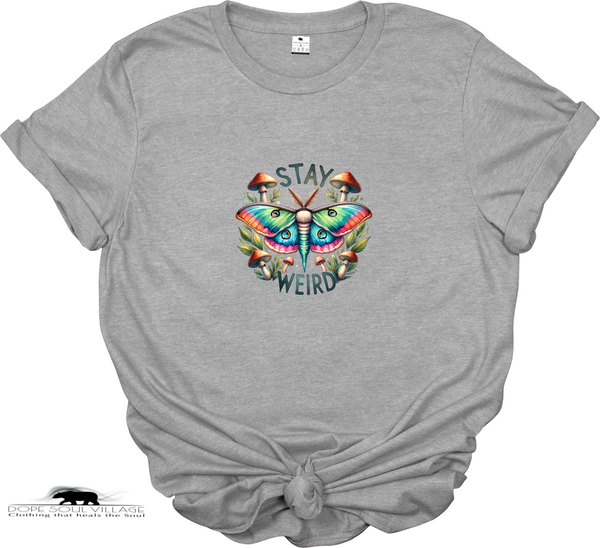 “Stay Weird” t-shirt with whimsical butterfly design. Sustainable, ethical tee perfect for individuality, quirky style, and magical everyday fashion.