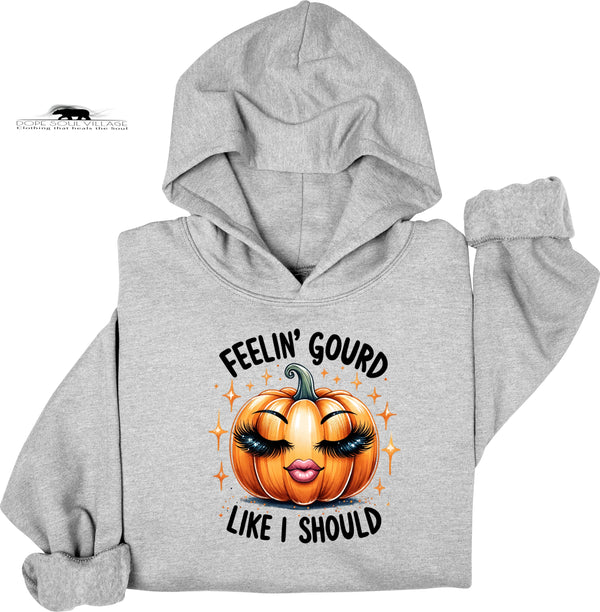 Gray hoodie with a pumpkin graphic and text on a white background