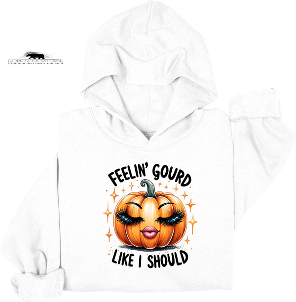 White hoodie with a pumpkin graphic and text on a white background