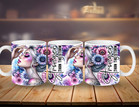 Three mugs with artistic designs and text on a wooden surface.