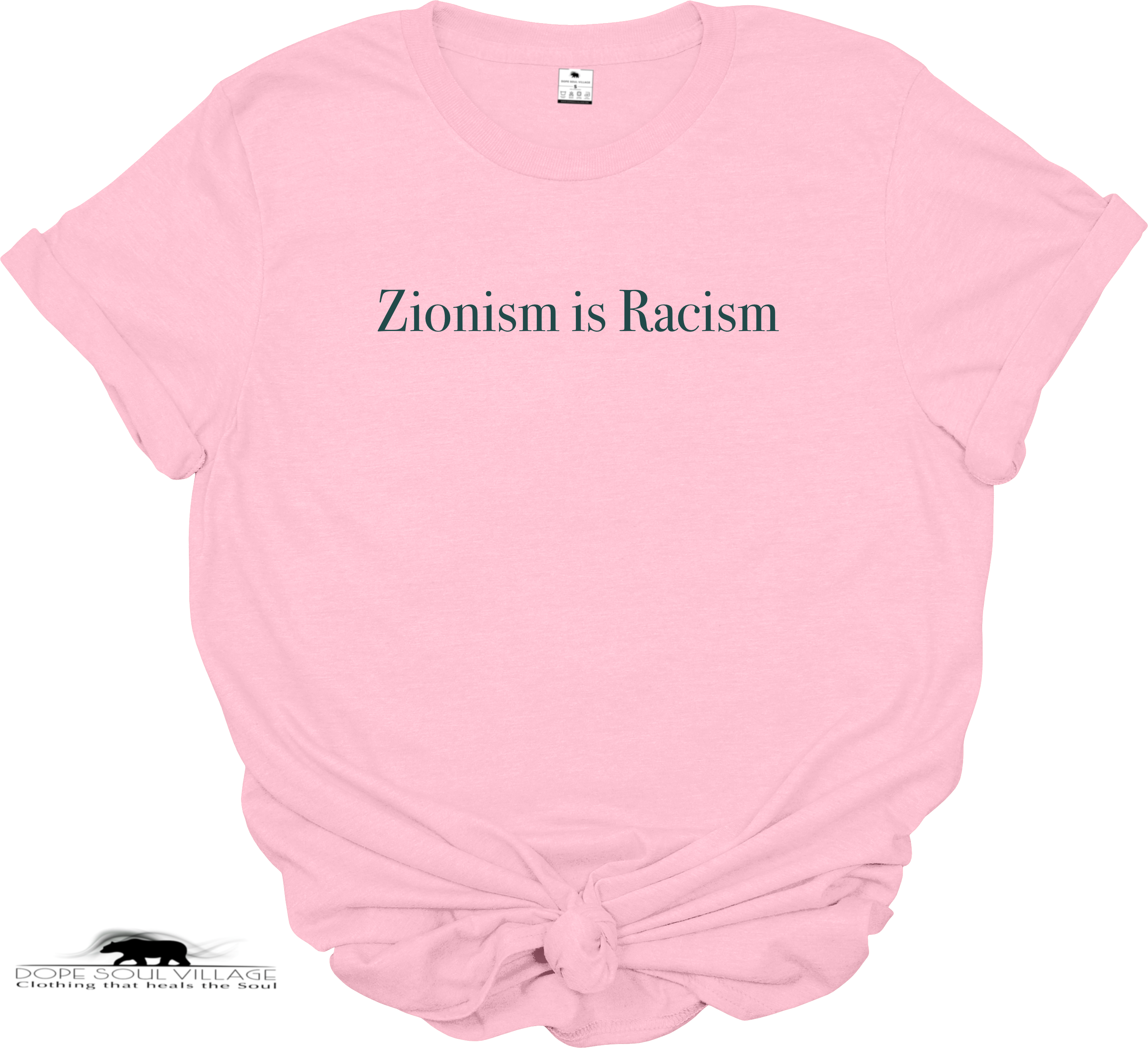 A light pink short-sleeve t-shirt with the text 'Zionism is Racism' printed in black serif font across the chest. The t-shirt is styled with a knot at the bottom hem, set against a plain white background. Available from Dope Soul Village women's marketplace.
